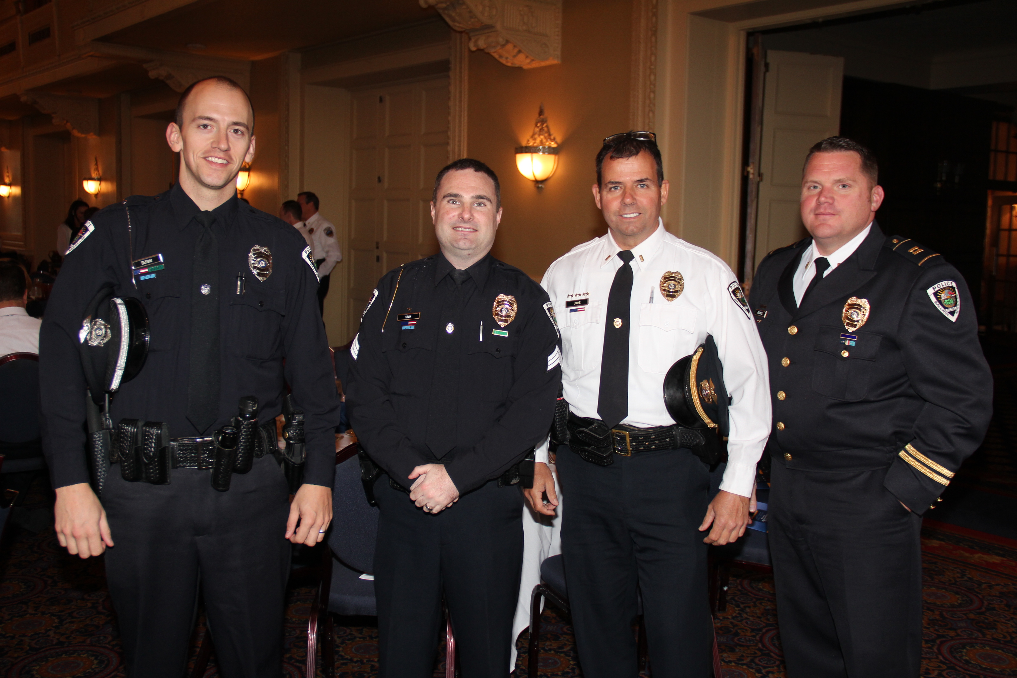 Officers Leo Bergin, Dan Hawk, honorees, Lt. Kevin Lorne, Capt. Buswell from City of