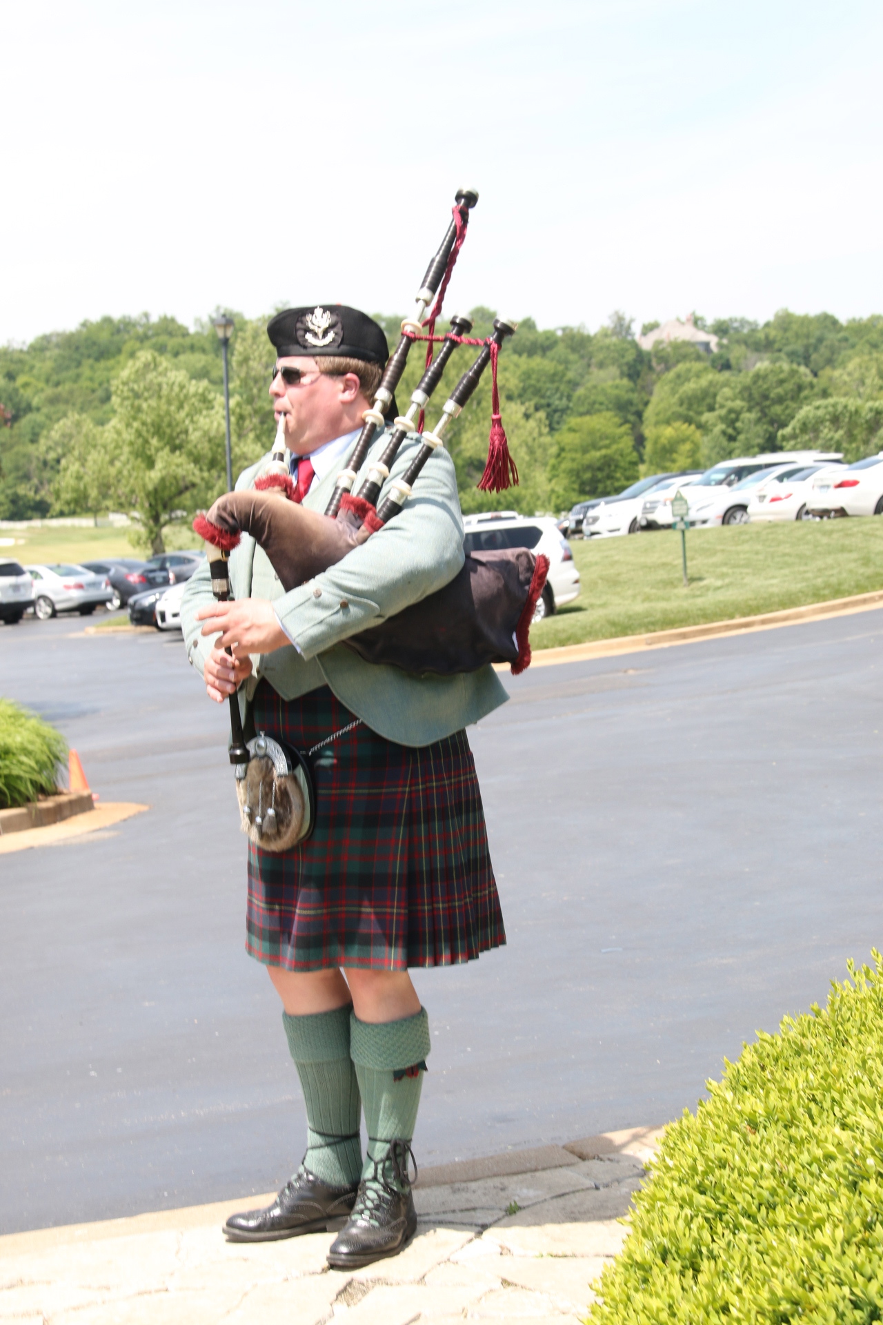 Scottish Bagpipes play as golfers depart