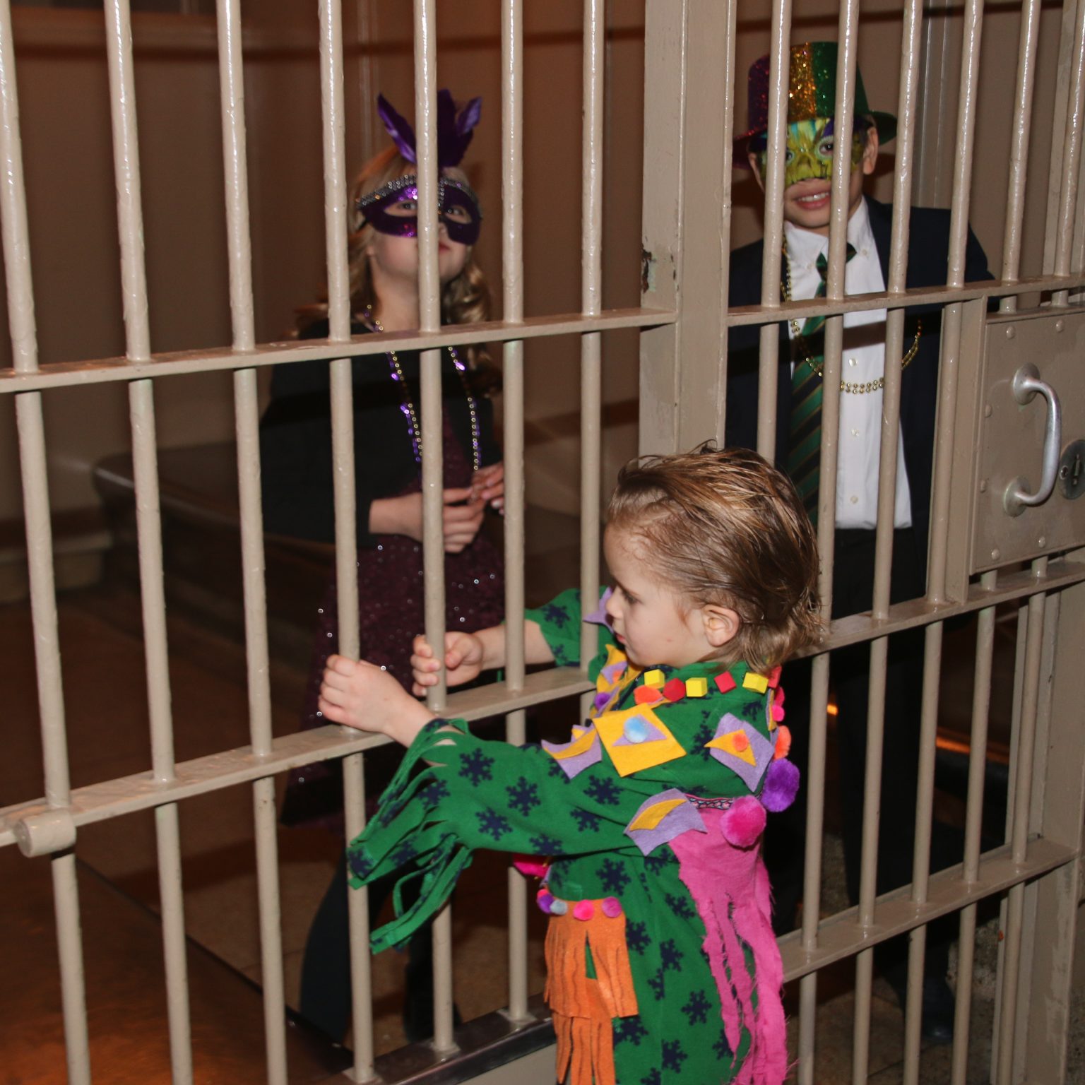 kids play in old jail cells